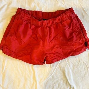 Patagonia Barely Baggie 2.5” short. Size S. Coral/reddish pink color.